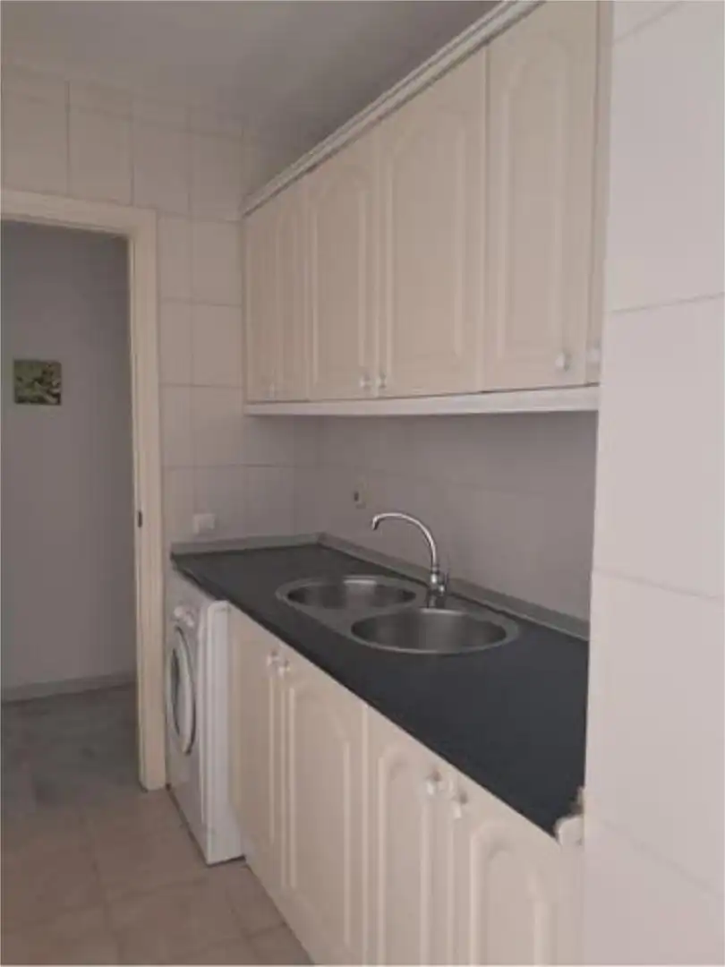 Piso de alquiler en La Barriguilla Cocina de Piso de alquiler en Málaga con Jardín privado, Terraza y Amueblado