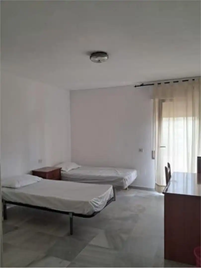 Piso de alquiler en La Barriguilla Habitación de Piso de alquiler en Málaga con Jardín privado, Terraza y Amueblado
