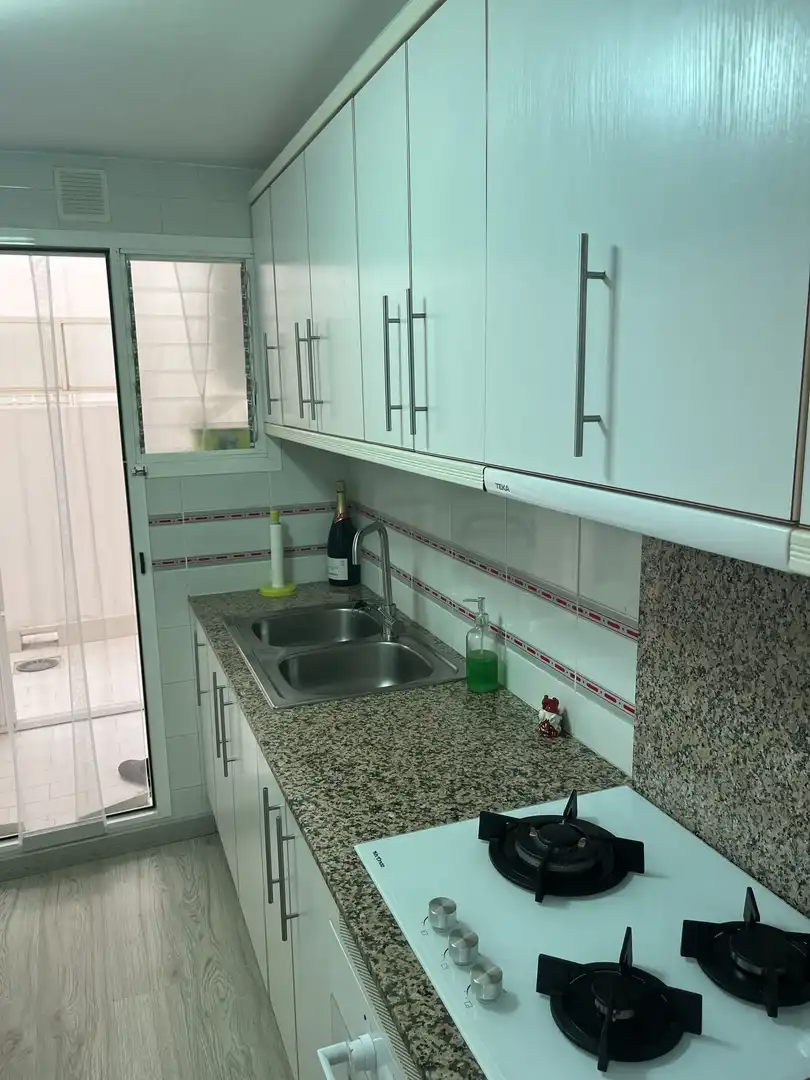 Küche von Wohnung zum Verkauf in Águilas mit Privatgarten, Parkett und Möbliert
