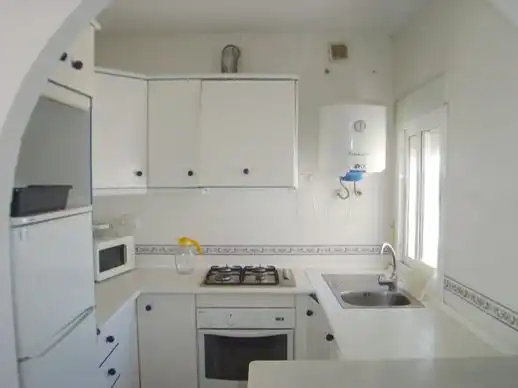 Attic for rent in Calle Alba, 8, Mojácar Playa - Las Ventanicas - La Paratá Kitchen of Attic for rent in Mojácar with Air Conditioner, Terrace and Swimming Pool