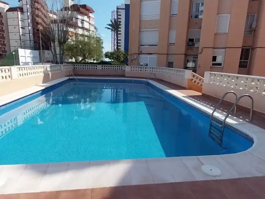 Apartments for rent in Avinguda de la Constitució, 13, Platja de la Pobla de Farnals Swimming pool of Apartments for rent in La Pobla de Farnals with Air Conditioner, Heating and Parquet flooring