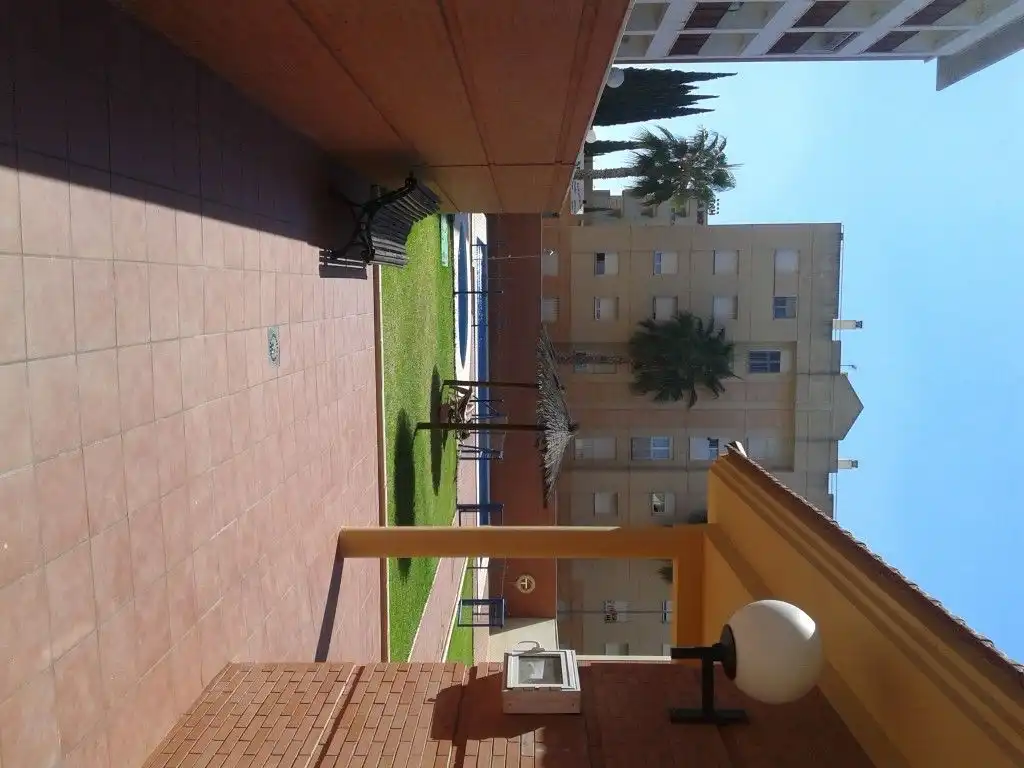Terraza de Piso de alquiler en Dos Hermanas con Aire acondicionado, Calefacción y Piscina