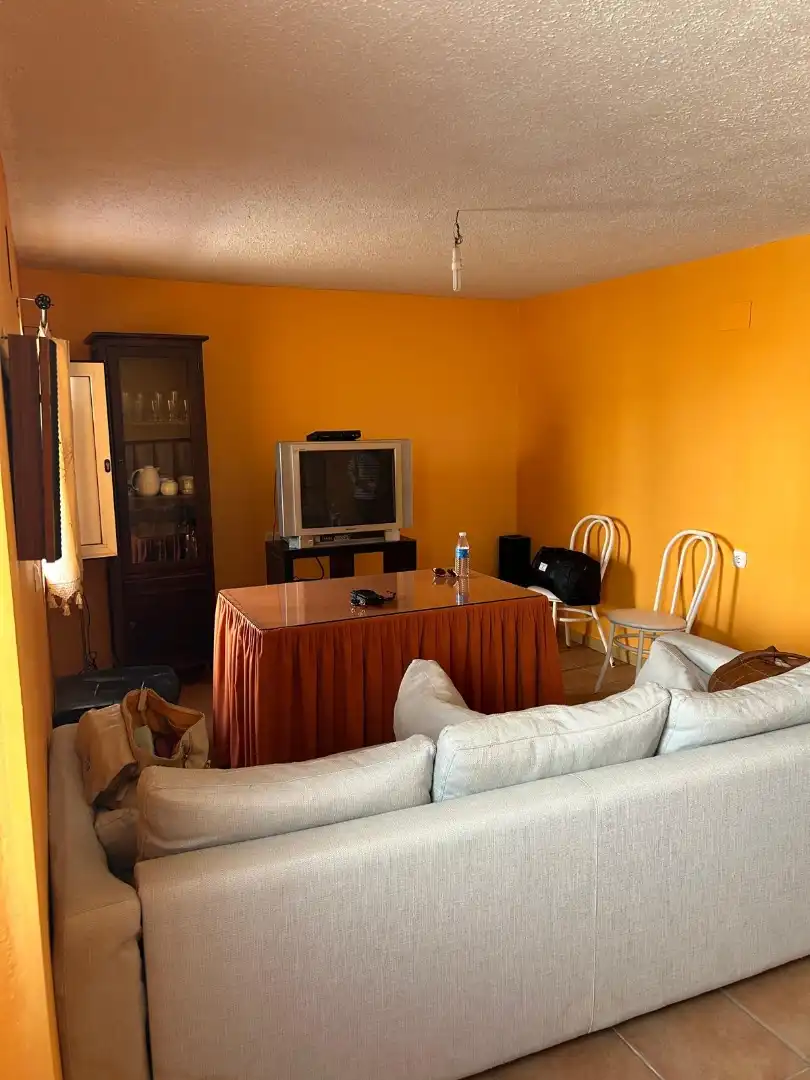 Sala d'estar de Casa adosada en venda en Feria amb Traster, Moblat i Rentadora