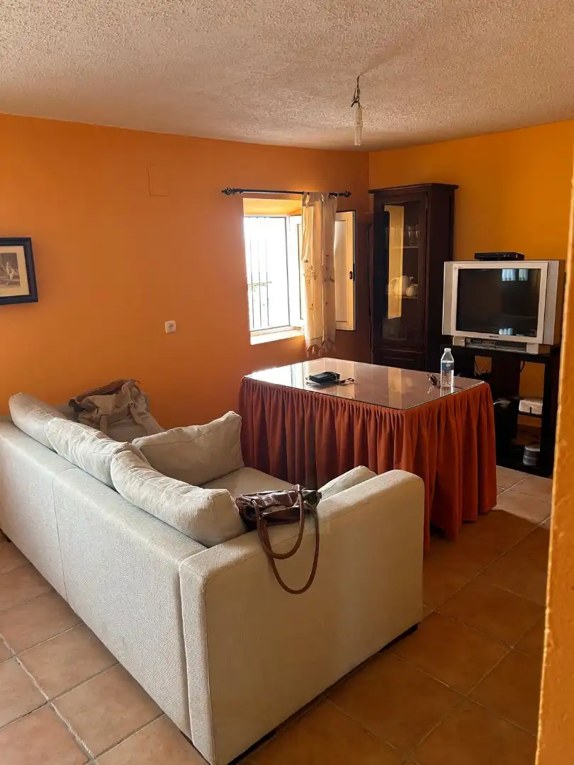 Sala d'estar de Casa adosada en venda en Feria amb Traster, Moblat i Rentadora