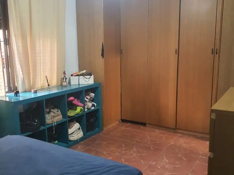 Casa adosada en venda a Calle Turia, 34, Coria del Río Dormitori de Casa adosada en venda en Coria del Río amb Traster i Balcó