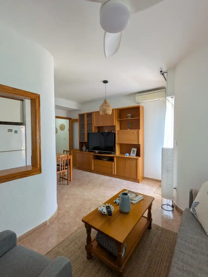 Wohnzimmer von Wohnung zum Verkauf in La Manga del Mar Menor mit Klimaanlage, Terrasse und Schwimmbad