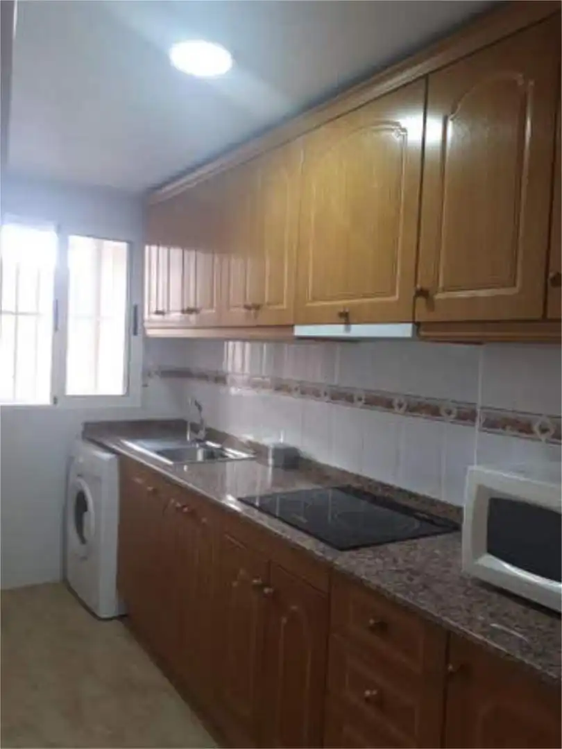 Cuina de Apartament de lloguer en Los Montesinos amb Piscina