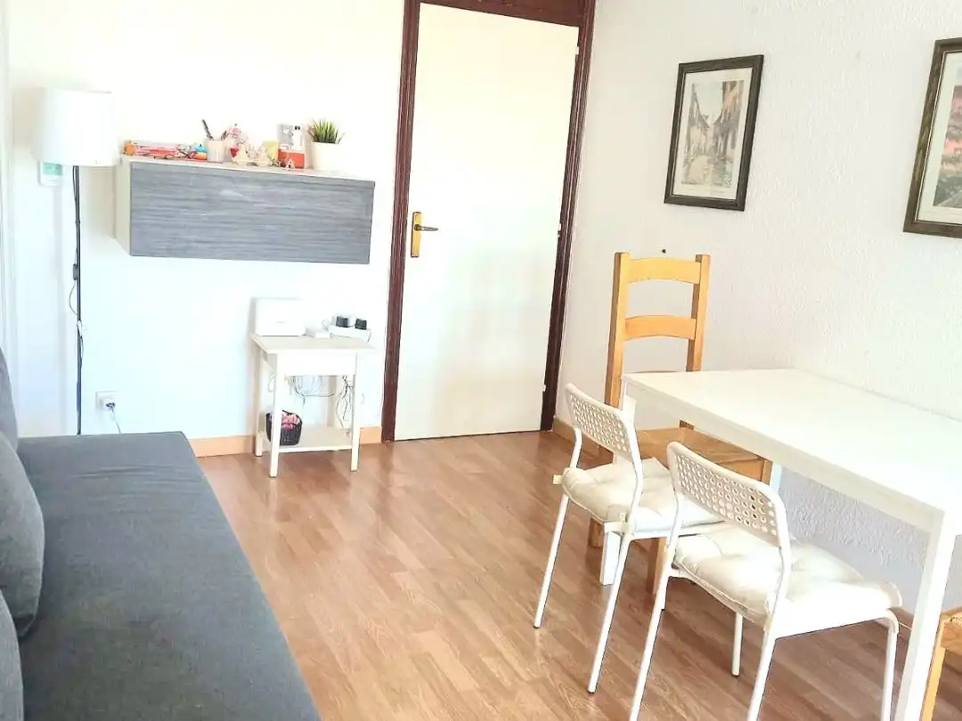Room in Carrer de la Conca de Tremp, 50, El Carmel Dining room of Flat for share in Barcelona with Air Conditioner, Heating and Parquet flooring