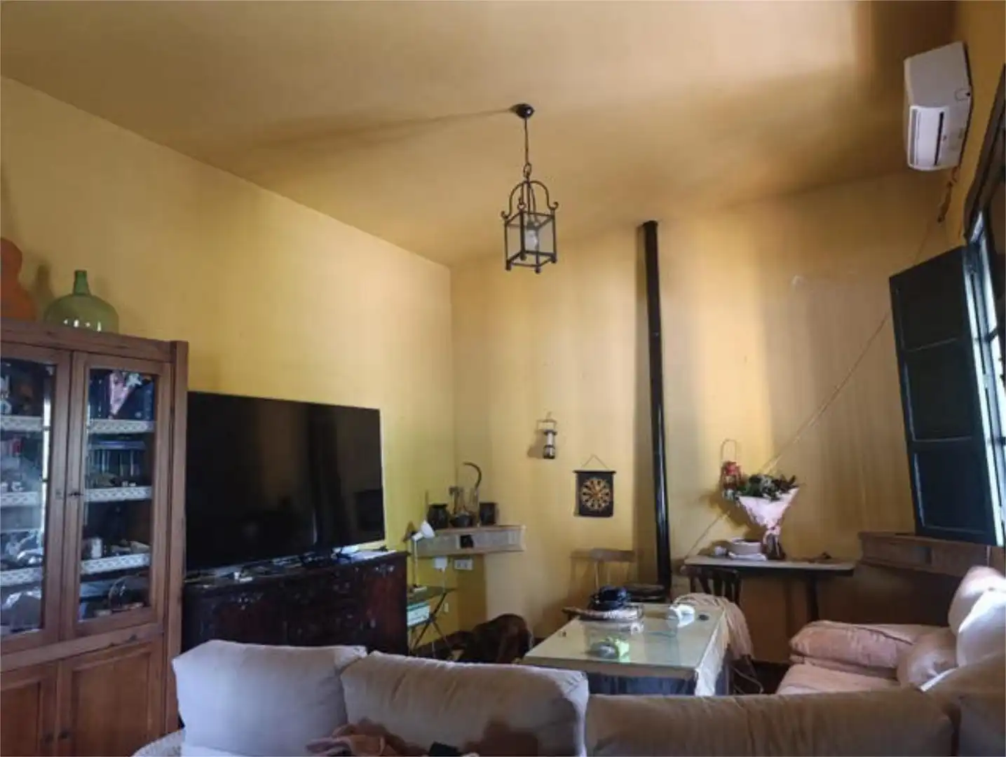 Casa adosada en venta en Umbrete Sala de estar de Casa adosada en venta en Umbrete