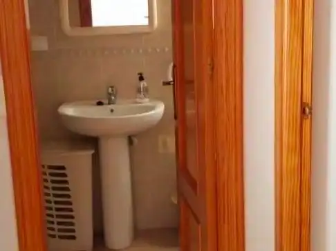 Flat for rent in Calle San Lorenzo, 17, Los Nietos Bathroom of Flat for rent in Cartagena with Air Conditioner, Terrace and Swimming Pool