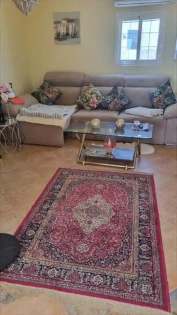 Wohnzimmer von Wohnung zum Verkauf in Pájara mit Heizung, Privatgarten und Terrasse