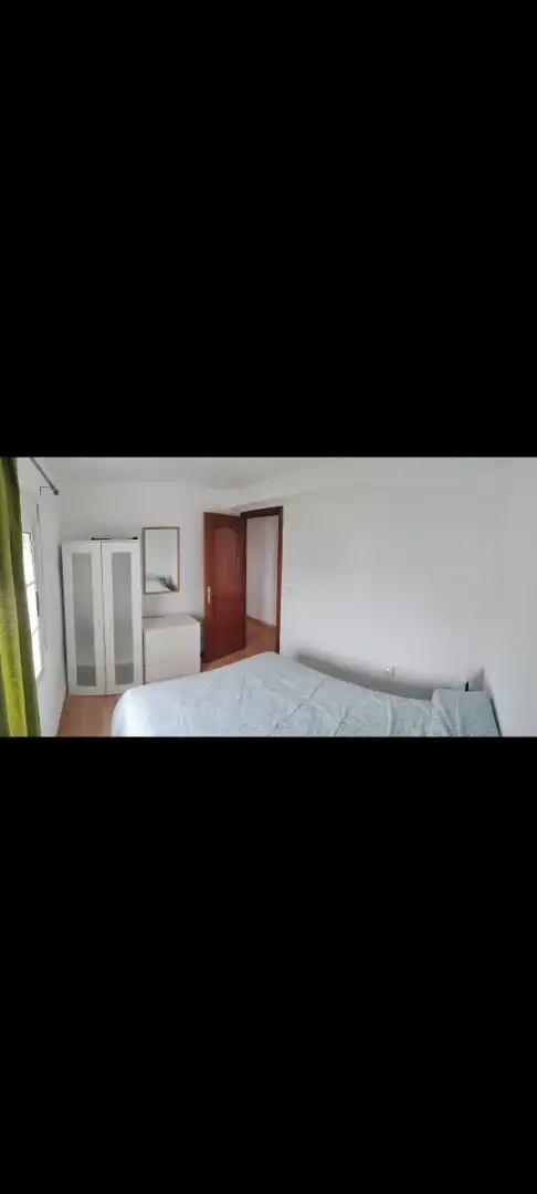 Bedroom of Flat for share in Sevilla  with Air Conditioner, Heating and Private garden