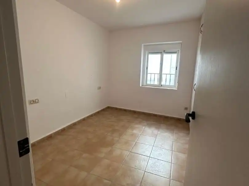 Habitación de Casa adosada en venta en Somontín con Parquet, Terraza y Trastero