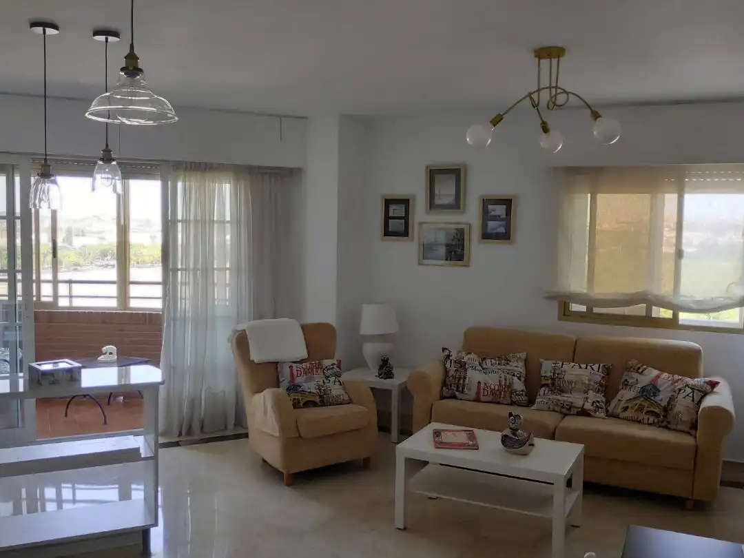 Flat for rent in Calle Virgen de la Oliva, 7, Barrio de los Remedios Living room of Flat for rent in Sevilla Capital with Air Conditioner and Balcony