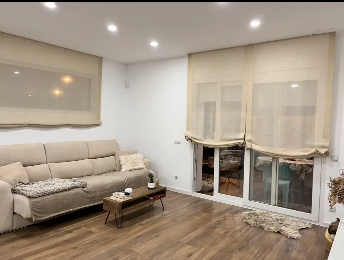 Sala de estar de Casa adosada en venta en Les Alqueries / Alquerías del Niño Perdido con Aire acondicionado, Calefacción y Jardín privado