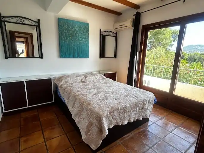 Casa o xalet de lloguer a Camino del Paellero, 32, Pinar del Advocat - Cometa Dormitori de Casa o xalet de lloguer en Moraira amb Aire condicionat, Calefacció i Jardí privat