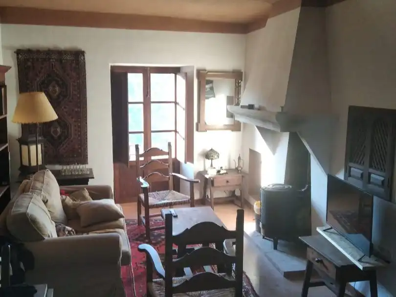 Sala de estar de Casa adosada en venta en La Taha con Aire acondicionado, Calefacción y Trastero