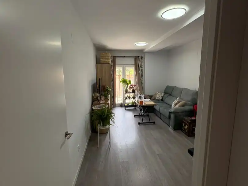 Piso en venta en Calle Álamos, 27, Residencial Triana - Barrio Alto Sala de estar de Piso en venta en Las Gabias con Aire acondicionado, Calefacción y Parquet