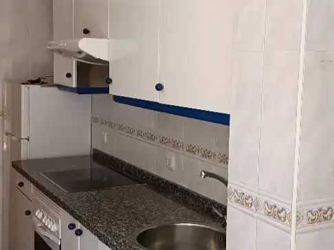Kitchen of Flat for sale in Oviedo   with Heating, Parquet flooring and Terrace