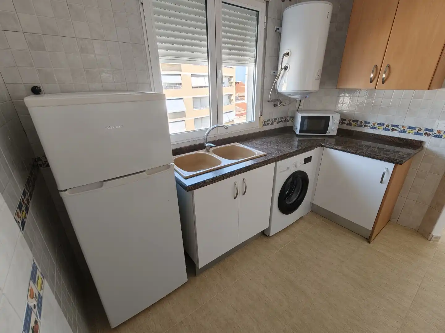 Wohnung zur Miete in Carrer Valencia, 23, L'Olleria Küche von Wohnung zur Miete in L'Olleria mit Ofen, Waschmaschine und Mikrowelle