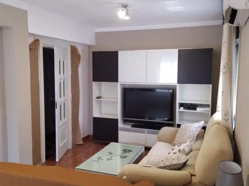 Sala d'estar de Pis en venda en Granada amb Aire condicionat, Moblat i Balcó