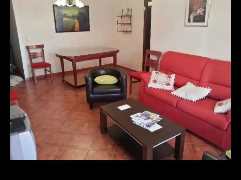 Living room of Flat for rent in Huelva  with Air Conditioner, Furnished and Balcony