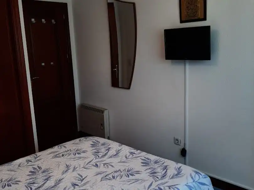 Pis de lloguer a Rúa Valle-Inclán, San Pedro da Ramallosa Dormitori de Pis de lloguer en Nigrán amb Calefacció, Parquet i Moblat