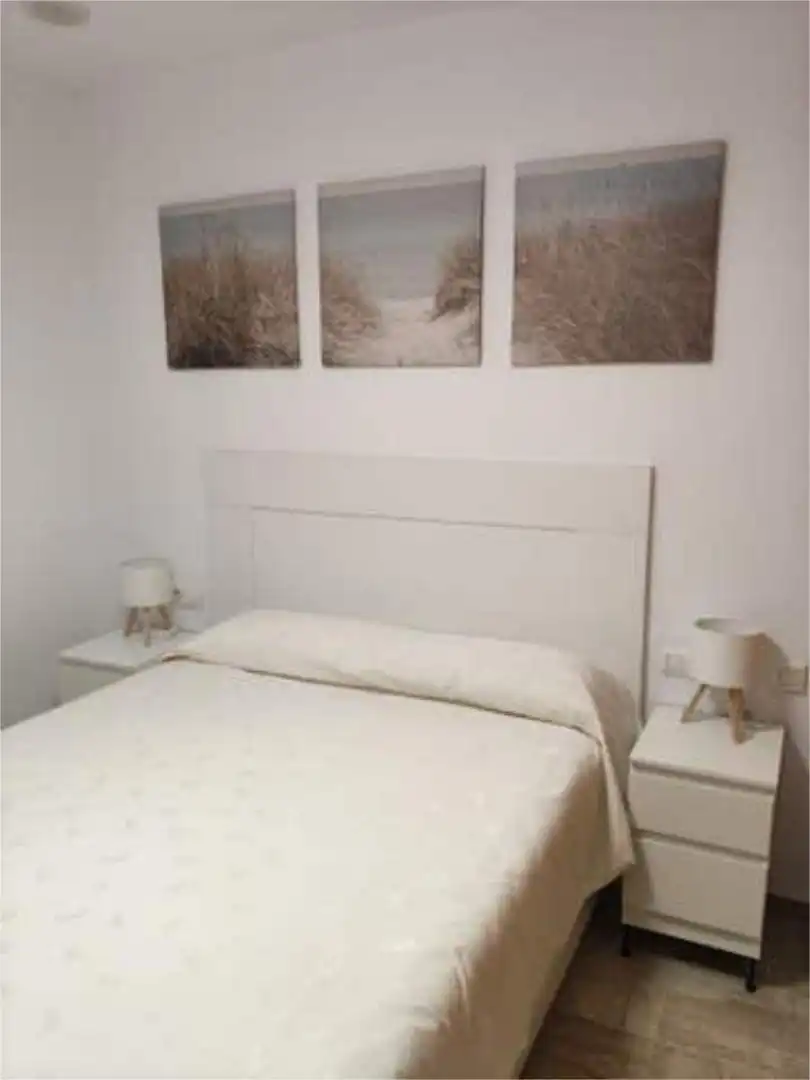 Habitación de Apartamento de alquiler en Chiclana de la Frontera con Jardín privado, Terraza y Piscina