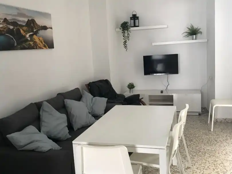Einfamilien-Reihenhaus zur Miete in Calle Alpechín, 25, Osuna Wohnzimmer von Einfamilien-Reihenhaus zur Miete in Osuna mit Parkett, Terrasse und Möbliert