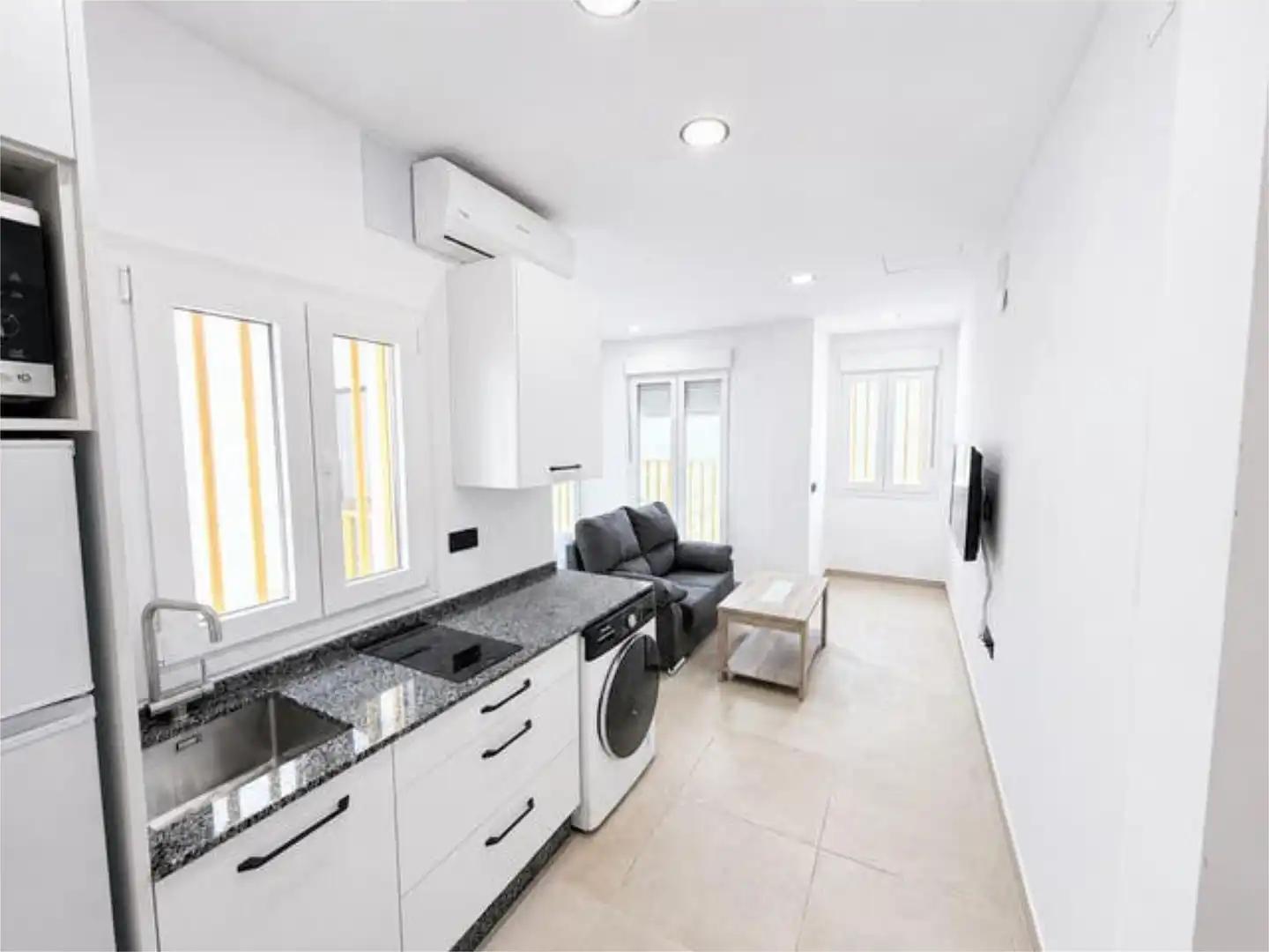 Kitchen of Apartments for rent in Espartinas  with Heating, Private garden and Furnished