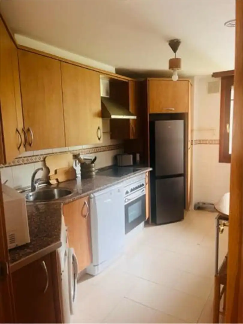 Piso de alquiler en Limpias Cocina de Piso de alquiler en Limpias con Jardín privado y Piscina