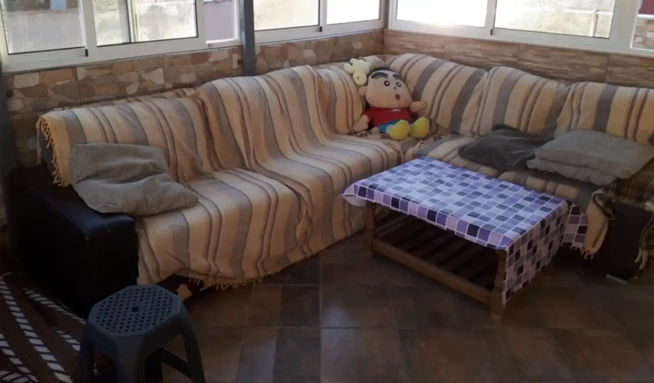 Sala d'estar de Casa adosada en venda en Melilla amb Aire condicionat i Terrassa