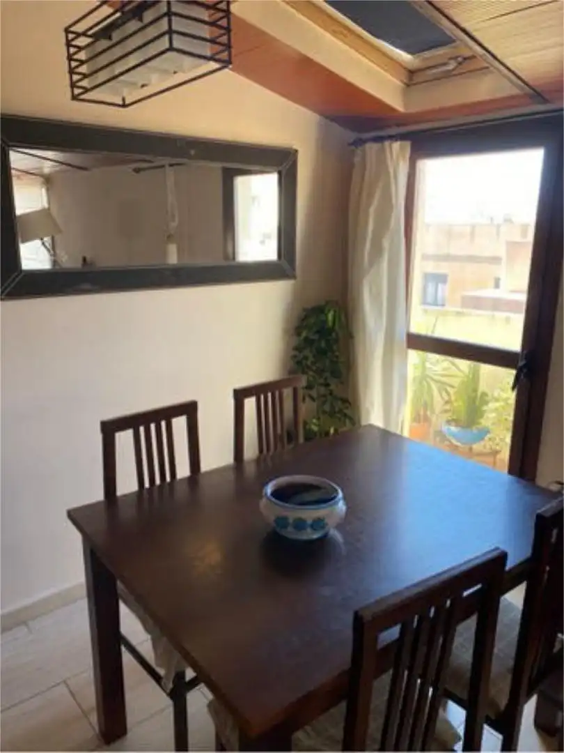 Attic for rent in Hipódromo Dining room of Attic for rent in Melilla with Heating, Terrace and Furnished