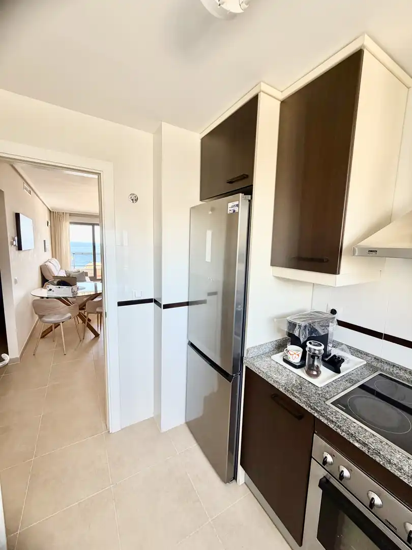 Flat for rent in Carrer Navío, 10, Calpe / Calp Kitchen of Flat for rent in Calpe / Calp with Air Conditioner, Terrace and Swimming Pool