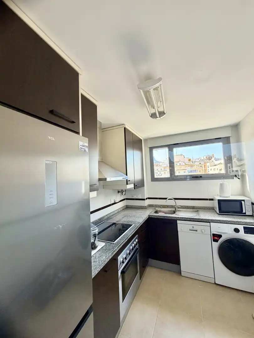 Flat for rent in Carrer Navío, 10, Calpe / Calp Kitchen of Flat for rent in Calpe / Calp with Air Conditioner, Terrace and Swimming Pool