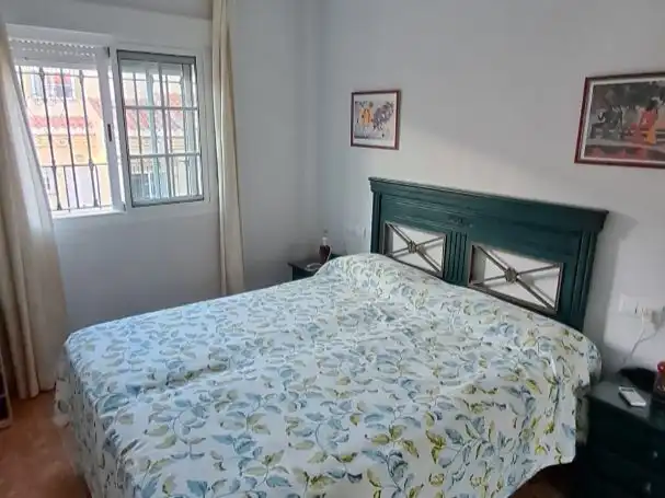 Casa adosada en venda a Calle Osa Mayor, 1, Salobreña Costa Dormitori de Casa adosada en venda en Salobreña amb Aire condicionat, Piscina i Moblat