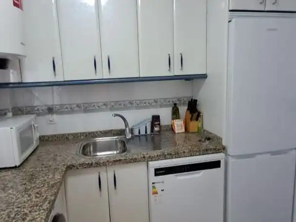 Casa adosada en venda a Calle Osa Mayor, 1, Salobreña Costa Cuina de Casa adosada en venda en Salobreña amb Aire condicionat, Piscina i Moblat