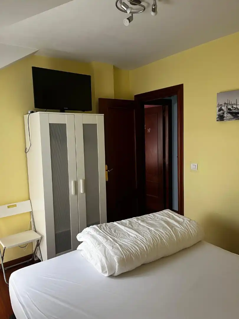 Wohnung zur Miete in Calle Quintana, 104, Suances Schlafzimmer von Wohnung zur Miete in Suances mit Heizung, Privatgarten und Parkett