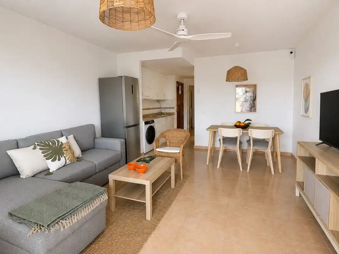 Apartamento de alquiler en Calle Pedro y Guy Vandaele, 19, Corralejo Sala de estar de Apartamento de alquiler en La Oliva con Aire acondicionado, Jardín privado y Terraza
