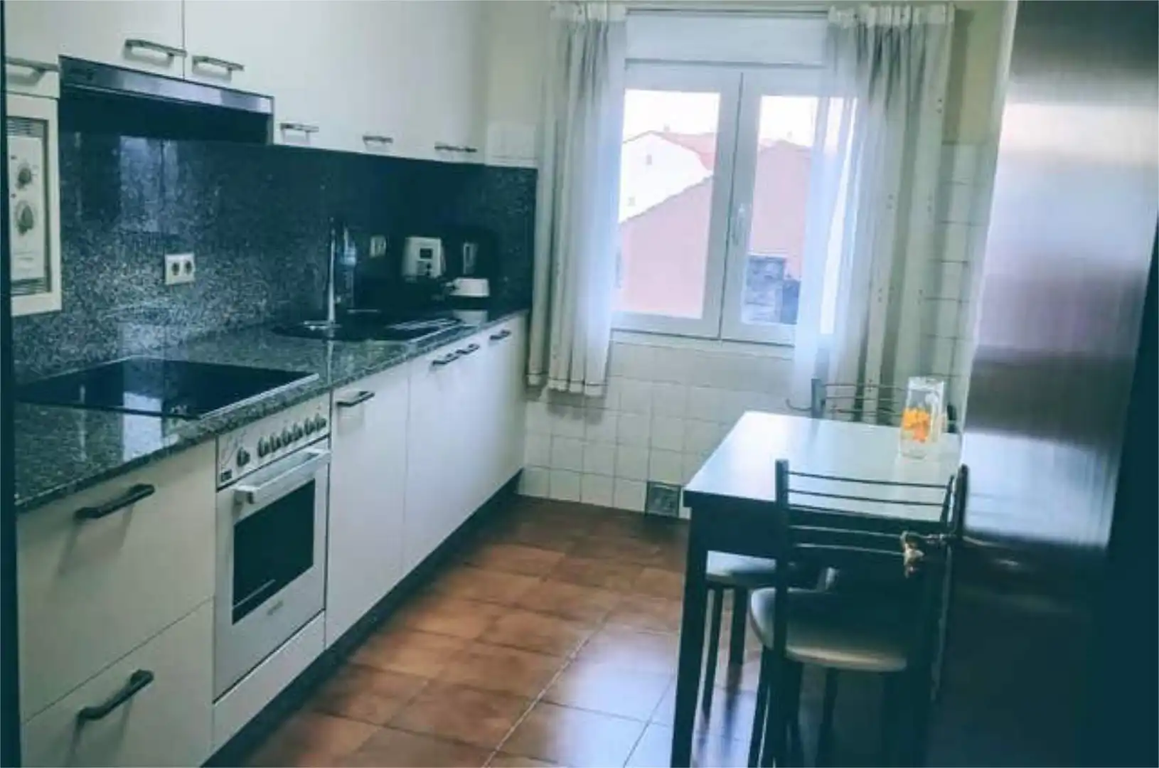 Piso en venta en O Grove Cocina de Piso en venta en O Grove con Calefacción, Jardín privado y Terraza