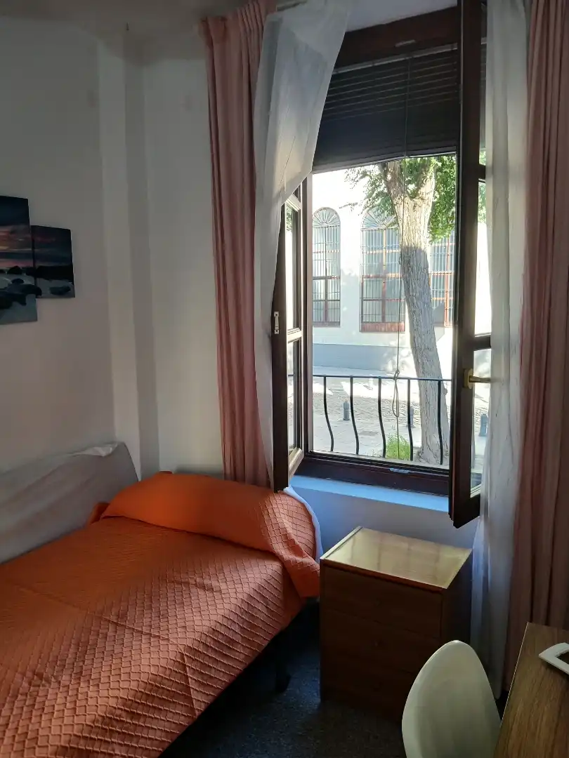 Pis de lloguer a Calle Palacios, 9, San Matías - Realejo Dormitori de Pis de lloguer en Granada amb Aire condicionat, Calefacció i Moblat