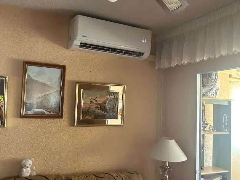 Piso en venta en Calle de Villalobos, 107, Palomeras Sureste Sala de estar de Piso en venta en Madrid con Aire acondicionado, Calefacción y Terraza