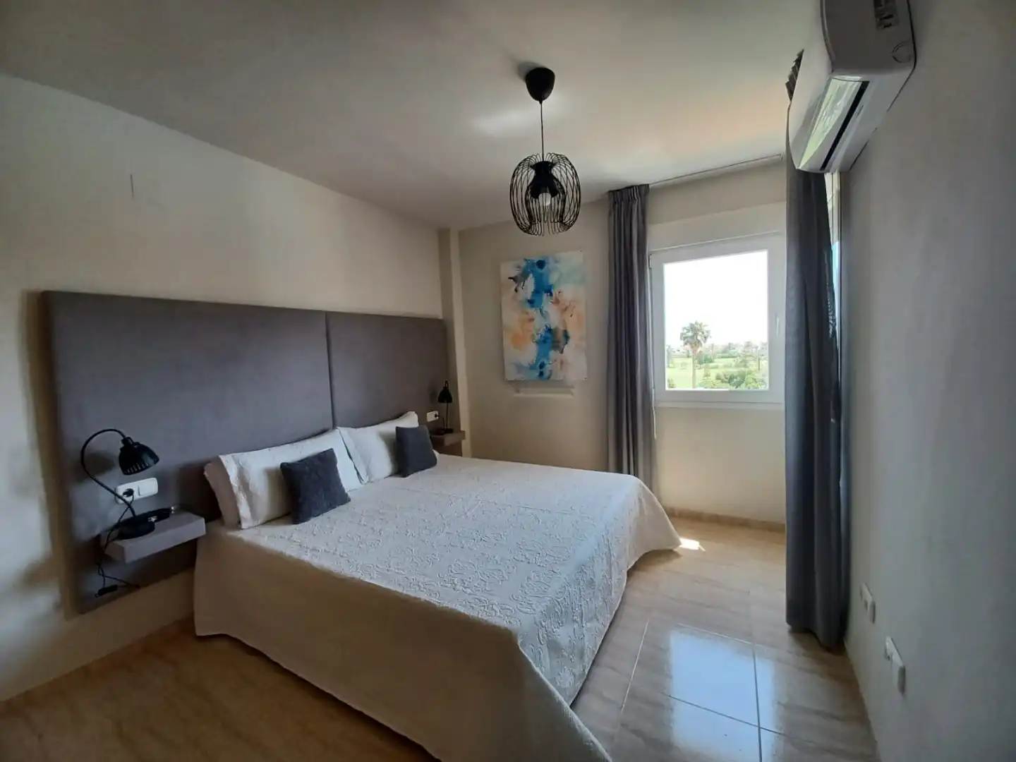 Apartament de lloguer a Calle Cabina, 19, Almerimar Dormitori de Apartament de lloguer en El Ejido amb Aire condicionat, Calefacció i Jardí privat