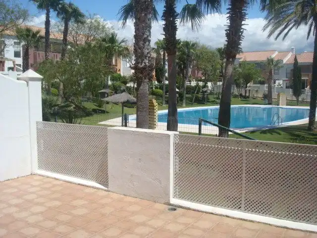 Apartments for rent in Camino Aldea del Coto, 11, Las Lagunas - Campano Swimming pool of Apartments for rent in Chiclana de la Frontera with Air Conditioner, Heating and Private garden