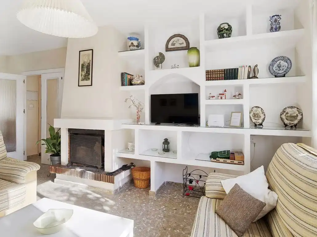 Wohnzimmer von Einfamilien-Reihenhaus zur Miete in El Puerto de Santa María mit Klimaanlage, Heizung und Privatgarten