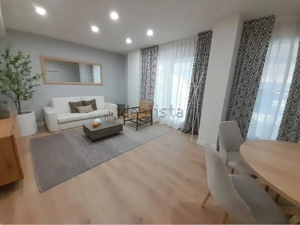 Pis de lloguer a Avenida Arrigo Boito, 1, Este Sala d'estar de Pis de lloguer en Málaga Capital amb Aire condicionat, Terrassa i Piscina