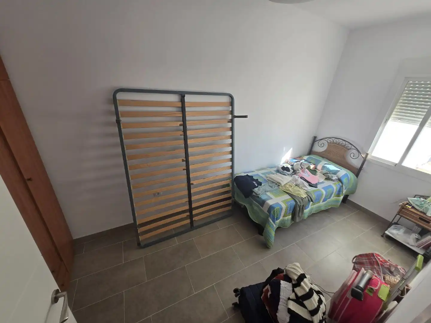 Casa adosada en venda a Calle Pedrín Benjumea Durán, 12, Palma del Río Dormitori de Casa adosada en venda en Palma del Río amb Aire condicionat i Terrassa