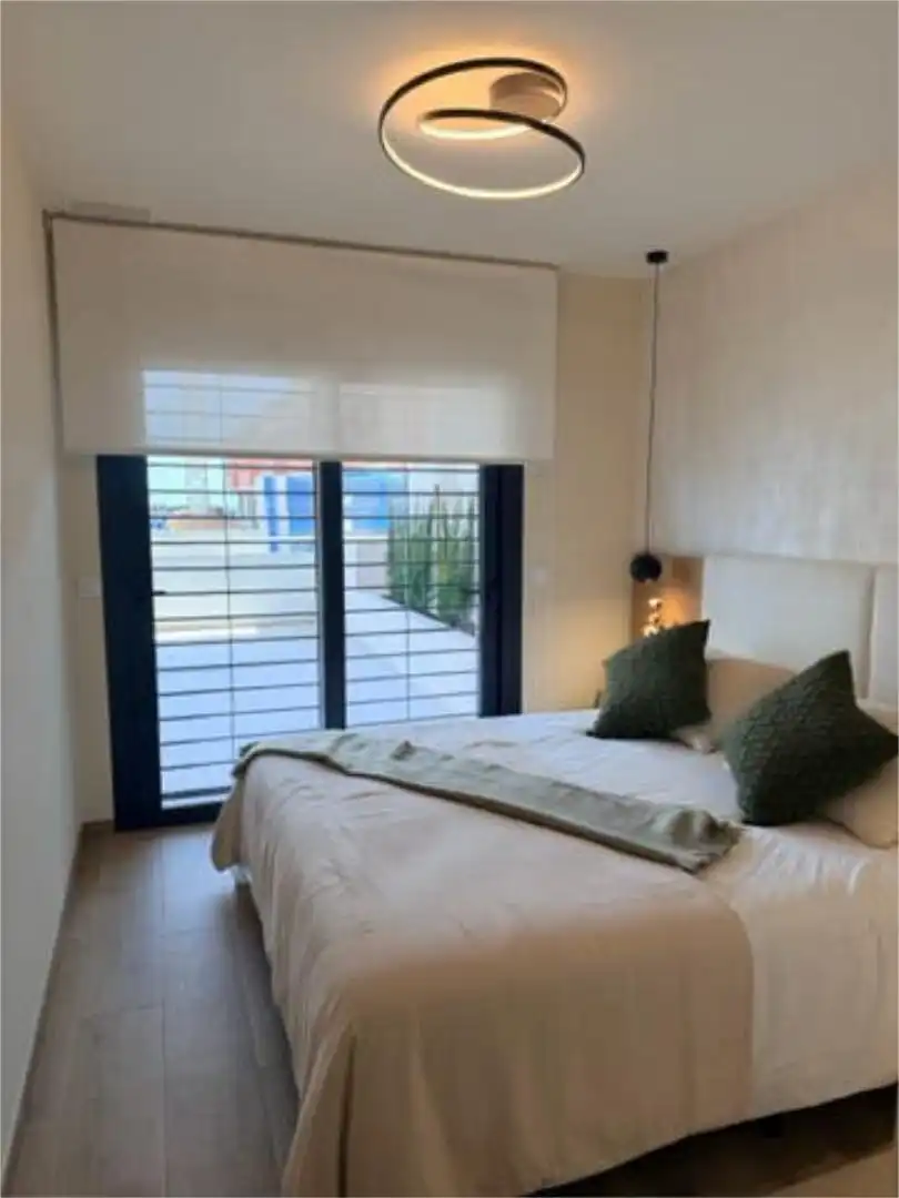 Apartament en venda a El Puig Dormitori de Apartament en venda en El Puig de Santa Maria amb Calefacció, Jardí privat i Terrassa