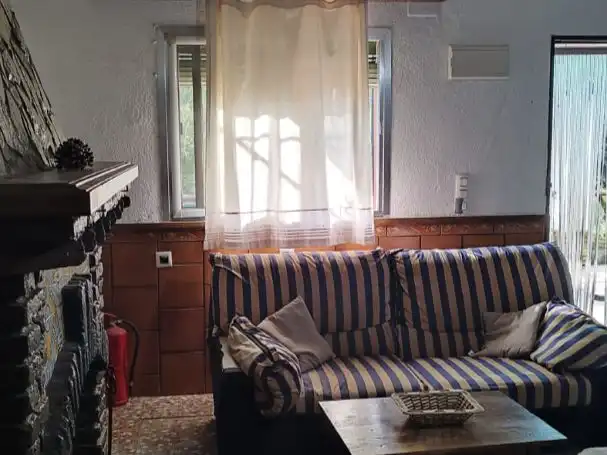 Casa o chalet de alquiler en Calle de la Encina, 1, Santa Maria de Trassierra Sala de estar de Casa o chalet de alquiler en Córdoba con Aire acondicionado, Calefacción y Jardín privado