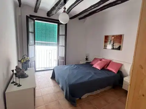Casa adosada en venda a Carrer les Voltes, 14, Riba-roja d'Ebre Dormitori de Casa adosada en venda en Riba-roja d'Ebre amb Terrassa i Traster